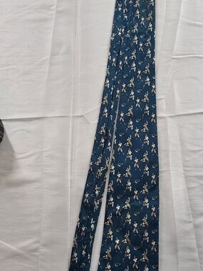 Classico Teal Hockey Player Pattern Tie with Cream and Maroon Details